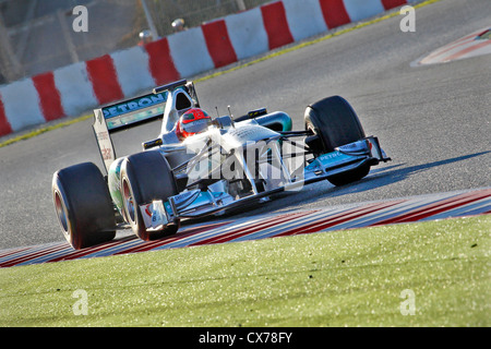 Michael Schumacher driving  for Mercedes GP in 2011 at Montmelo racing track in Barcelona, Spain Stock Photo