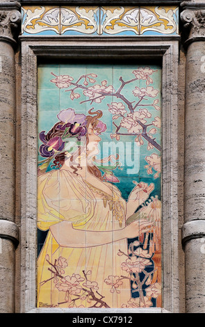 Brussels, Belgium. Art Nouveau detail (ceramic tiles by Privat Livemont) on facade of Anciennne Grande Maison de Blanc Stock Photo