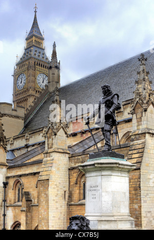 Statue of Oliver Cromwell, Old Palace Yard and the Palace of Westminster, London, UK Stock Photo