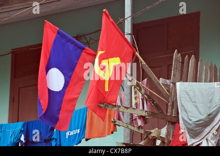 Laos flag and communist flag before the house door Luang Prabang Laos Asia Stock Photo