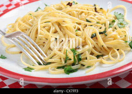 Dried linguine Italian pasta in a country kitchen lying on grungy oven ...