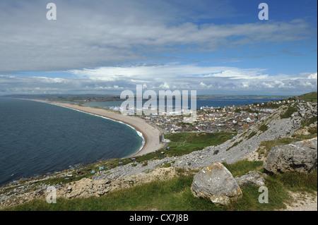 Dead Mans Bay and View over Portland, the Harbour  and Chesil beach from Tout Quarry.  Clouds  over the Heritage coastline Stock Photo