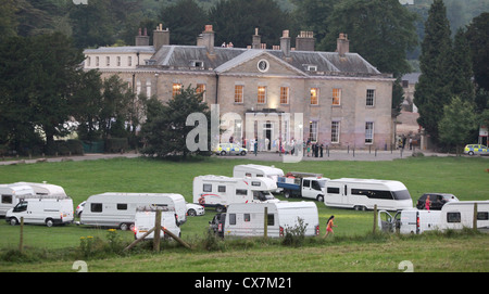 Travelers descend on Stanmer House near Brighton during a wedding. Picture by James Boardman. Stock Photo