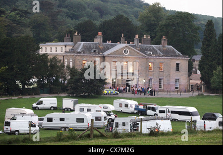 Travelers descend on Stanmer House near Brighton during a wedding. Picture by James Boardman. Stock Photo