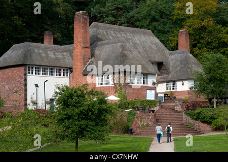 Drum inn Cockington,Public house. c1934, designed by Sir Edwin Lutyens,Plastered walls on tall Flemish  bond red brick footings; Stock Photo