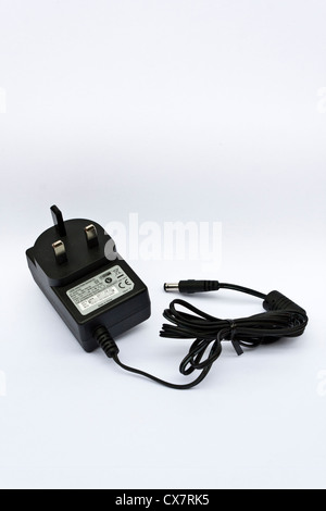 A UK 240v 3-pin ac/dc adaptor. Stock Photo