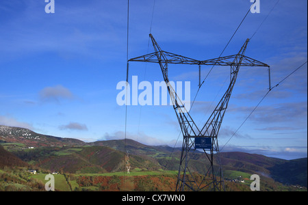 Electricity pylons near O'Cebreiro in Spain. Stock Photo