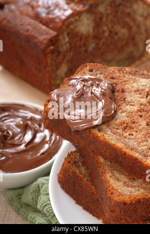 Freshly baked banana and chocolate nut bread with Nutella Stock Photo