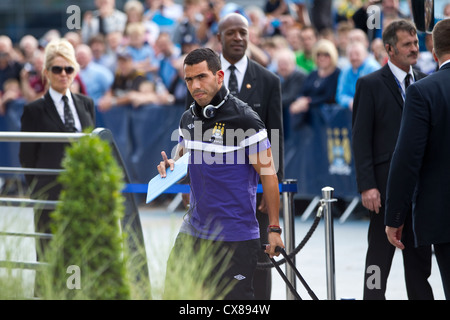 Carlos Tevez footballer arriving at the Etihad Stadium, Manchester City Football Club, Manchester, England, United Kingdom Stock Photo