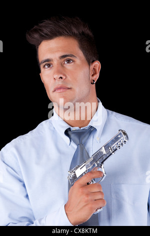 Powerful businessman with a gun (isolated on black) Stock Photo