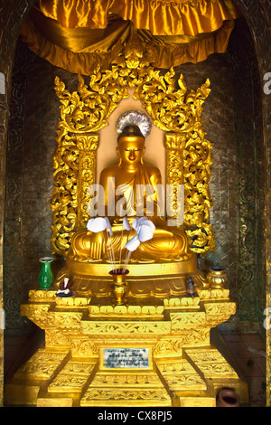 BUDDHA STATUE at the BUDDHIST PAYA in the hill town of PYIN U LWIN known as MAYMYO - MYANMAR Stock Photo