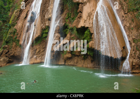 ANISAKAN FALLS drops into a green pool a few miles outside of PYIN U LWIN also known as MAYMYO - MYANMAR Stock Photo