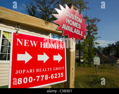 Custom homes sign at a building site Stock Photo