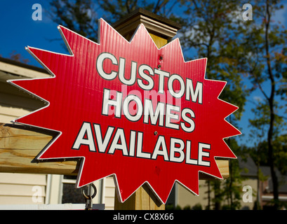 Custom homes sign at a building site Stock Photo