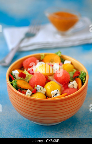 Curly endive with fruit and blue cheese. Recipe available. Stock Photo