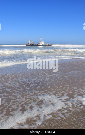 Shipwreck on a beach, Skeleton Coast, Namibia Stock Photo