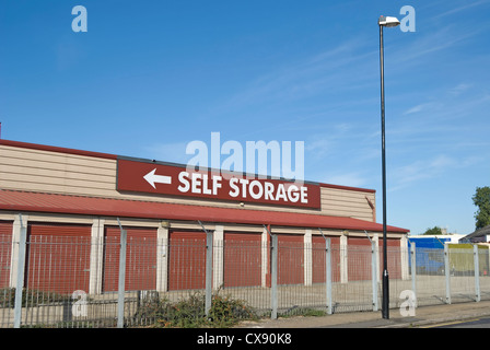 self storage facility with left pointing sign, hanworth, middlesex, england Stock Photo