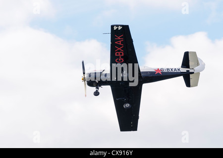 Russian Yakovlev Yak-52 airplane (G-BXAK) Stock Photo