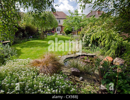 english 1930's house back garden Stock Photo