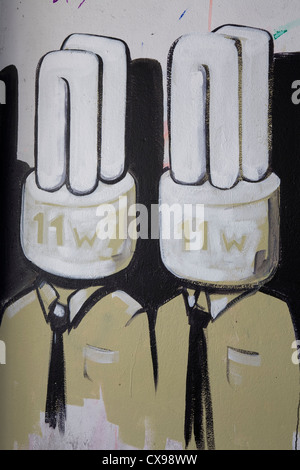 Light Bulb Graffiti on walls Liverpool City centre graphic artist political statement Stock Photo