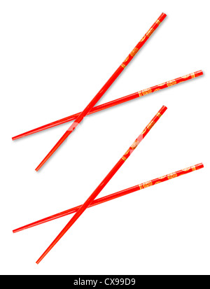 Pair of red chopsticks isolated on white with clipping path included Stock Photo
