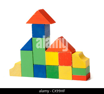 Simple house made from colorful wooden building blocks Stock Photo