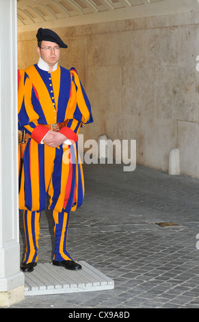 Vatican City, Vatican - 28 March, 2012: Papal Swiss guard in uniform at the entrance to papal residence in Vatican City Stock Photo