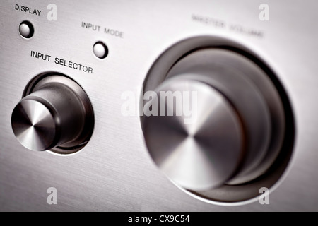 Horizontal shot of some hifi knobs from a stereo amplifier Stock Photo