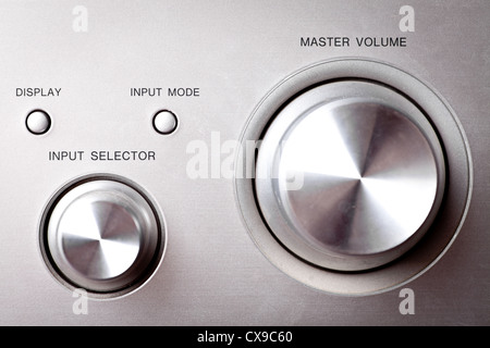 Horizontal shot of some hifi knobs from a stereo amplifier Stock Photo