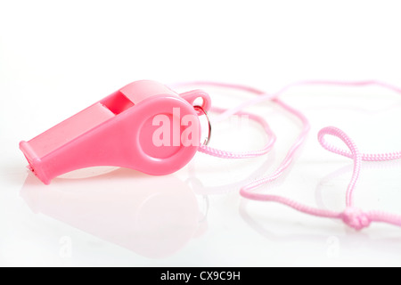 Pink whistle blower on a white background. Stock Photo