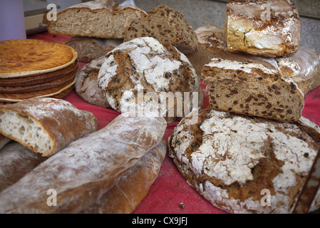 Home made bread on sale at a market in Spain. Stock Photo