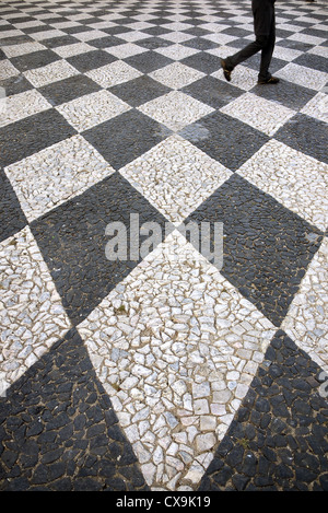 Black and white chequered paving in Tomar, Portugal. Stock Photo