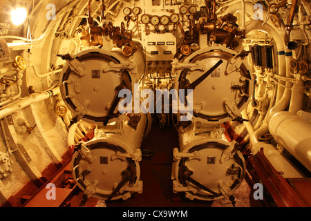 The torpedo tubes onboard the British built Lembit submarine at the Seaplane Harbour in Tallinn, Estonia. Stock Photo