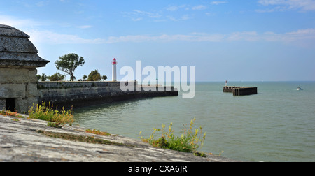 View from rampart over the lighthouse in the harbour at Saint-Martin-de-Ré on the island Ile de Ré, Charente-Maritime, France Stock Photo