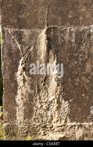 Long term structural damage caused from leaking water building up calcium carbonate deposits through concrete that has cracked Stock Photo