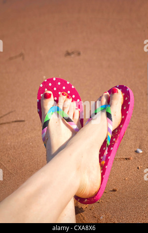 Flip flops, painted toes Stock Photo - Alamy