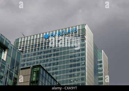 Dark Clouds over the head office building of barclays bank - canary wharf, docklands london Stock Photo