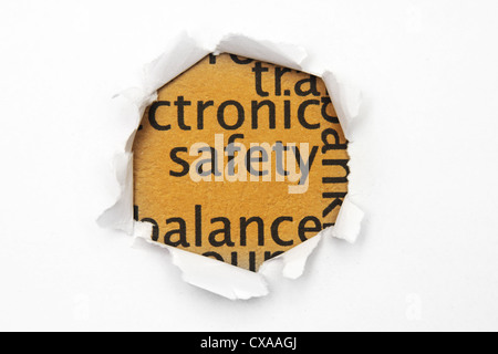 Safety text on paper hole Stock Photo