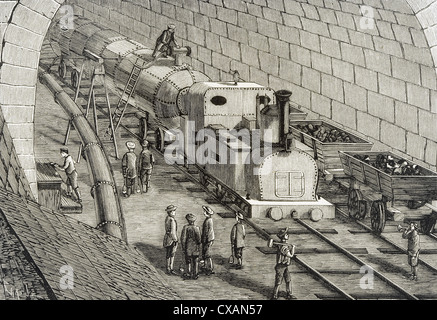 Switzerland. 19th century. Locomotive driven by compressed air used for the drilling of Saint-Gothard. Engraving. Stock Photo