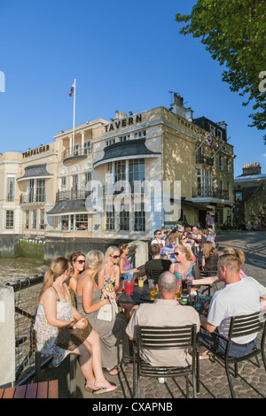 People enjoying a summer day at the Trafalgar Tavern in Greenwich, London, UK Stock Photo