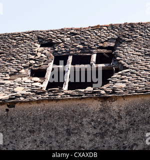 Old Stone Barn Building with Tiled Roof in State of Collapse at Laval near Pradinas Aveyron Midi-Pyrenees France Stock Photo