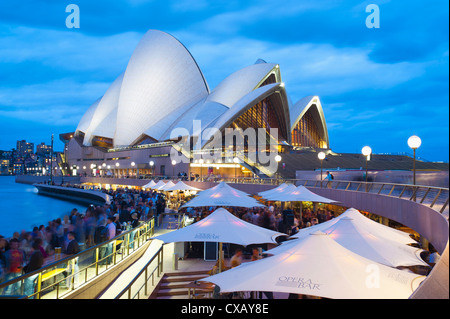 People at the Opera Bar in front of Sydney Opera House, UNESCO World Heritage Site, at night, Sydney, New South Wales, Australia Stock Photo