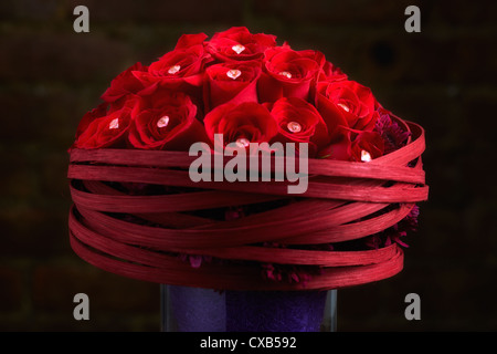 Red Rose and Purple Chrysanthemum Flower Arrangement Stock Photo
