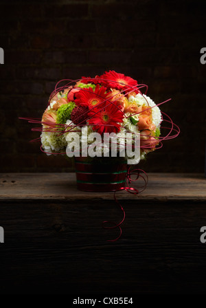 Holiday Gerbera, Hydrangea and Rose Flower Arrangement Stock Photo