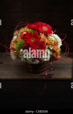 Holiday Gerbera, Hydrangea and Rose Flower Arrangement Stock Photo