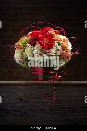 Holiday Gerbera, Hydrangea and Rose Flower Arrangement Stock Photo