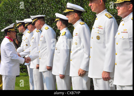 Adm. Soeparno, Chief of Naval Staff, Indonesian navy, is greeted by senior leadership during a welcoming ceremony hosted by Chief of Naval Operations Adm. Gary Roughead at the Washington Navy Yard. Stock Photo