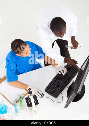 overhead view of two african american medical lab technicians working in lab Stock Photo