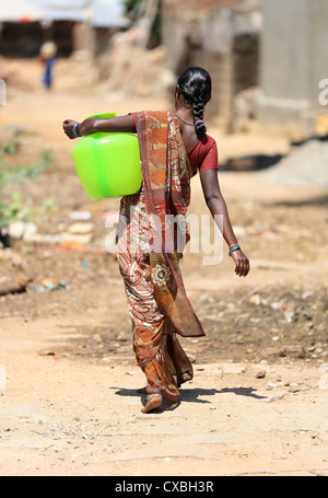 Rural woman carrying water Andhra Pradesh South India Stock Photo