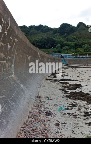 Defensive sea wall protecting against erosion Stock Photo